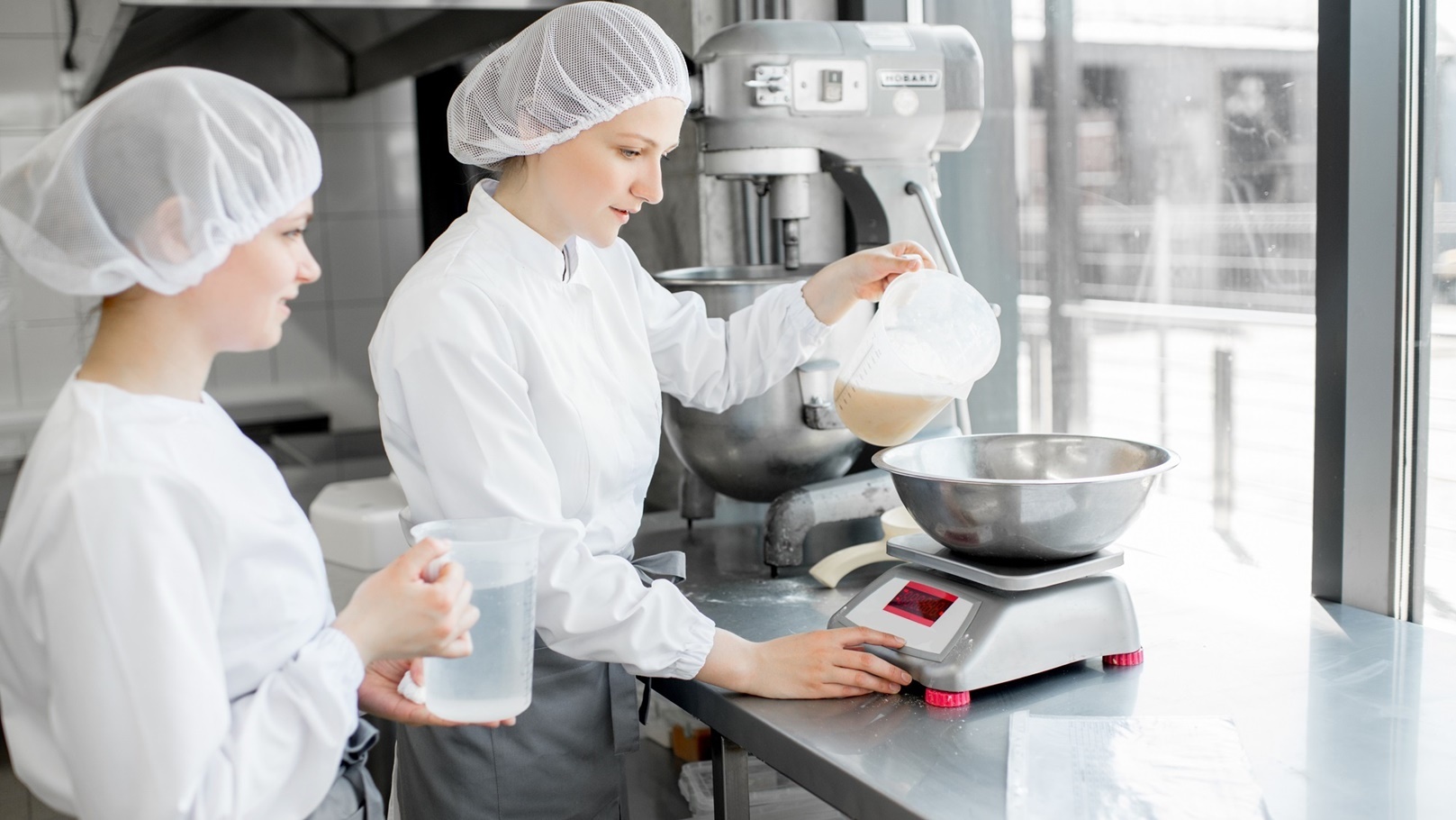 confectioners-working-at-the-bakery-manufacturing-2021-12-09-20-36-38-utc