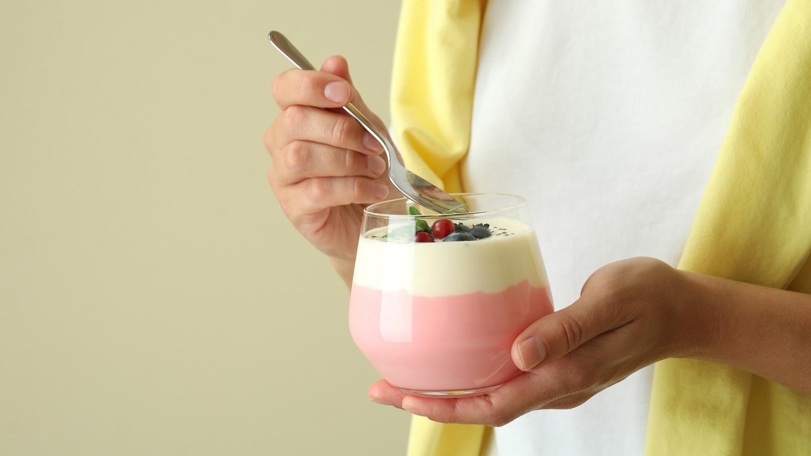 young-woman-eats-berry-yogurt-close-up-2021-09-04-04-09-58-utc