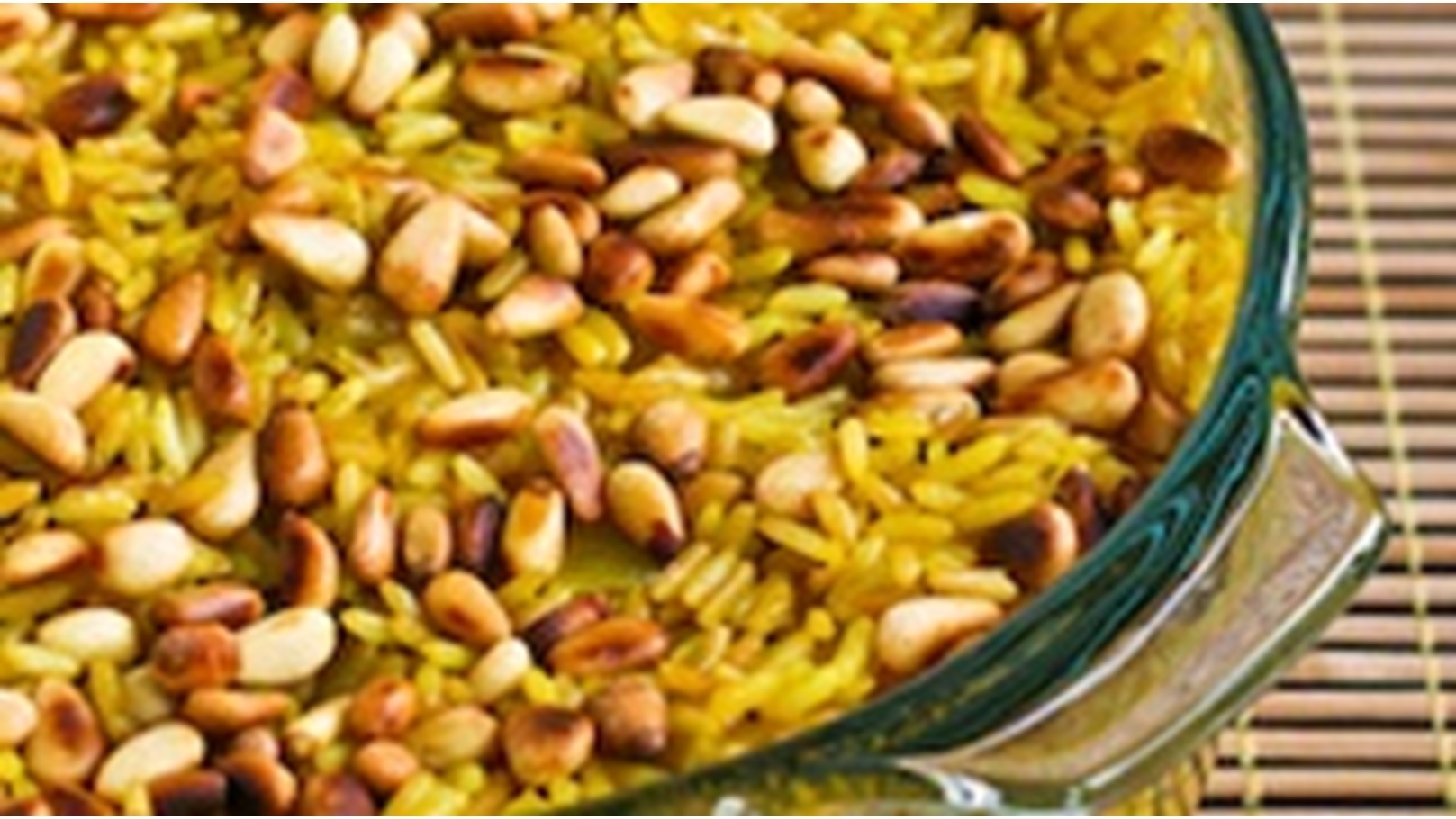 166950-baked-lemon-curry-rice-with-pine-nuts_e12405599044b2258400088ea97830ea