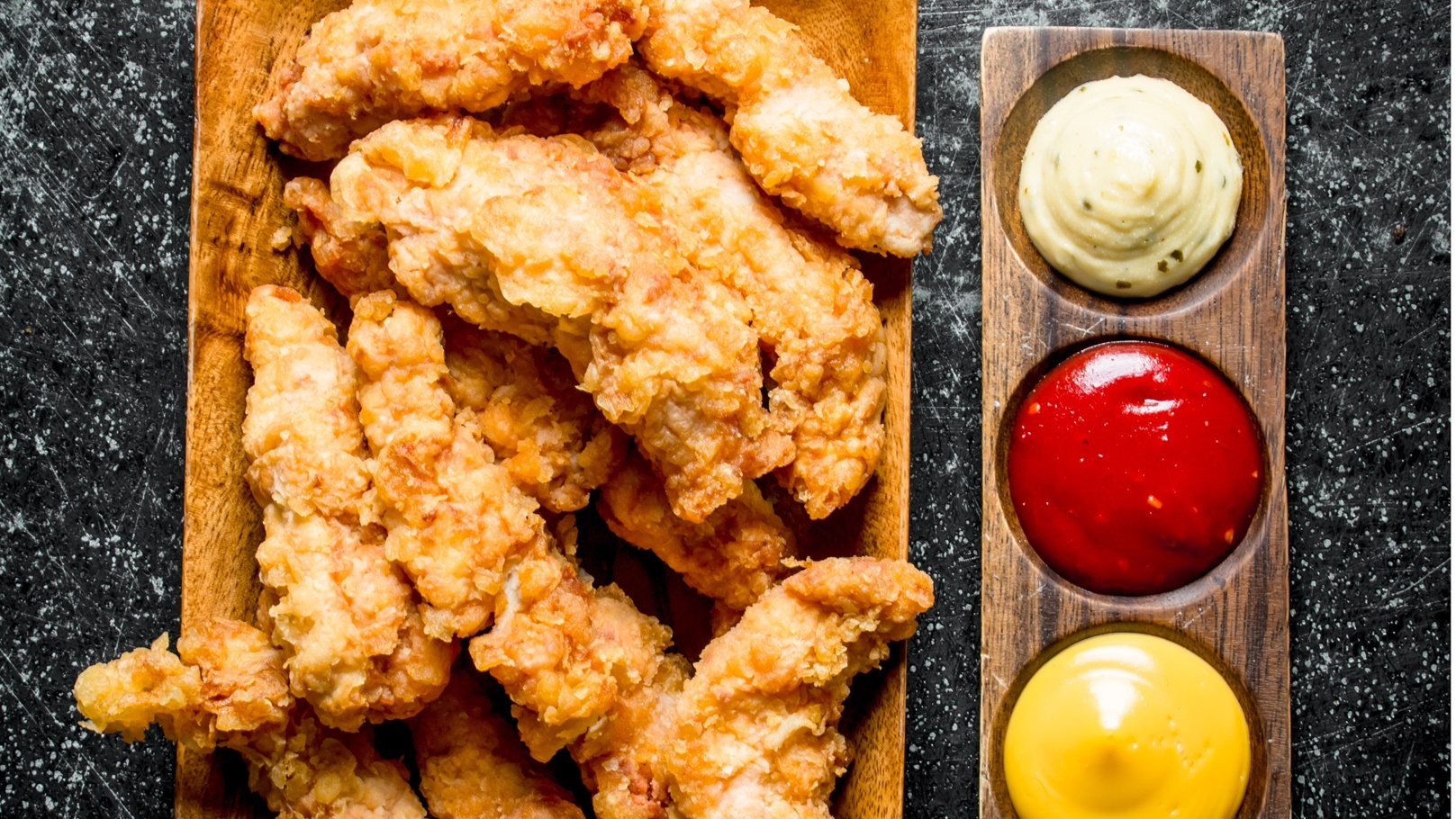 chicken-strips-with-different-sauces-2021-08-30-04-18-45-utc