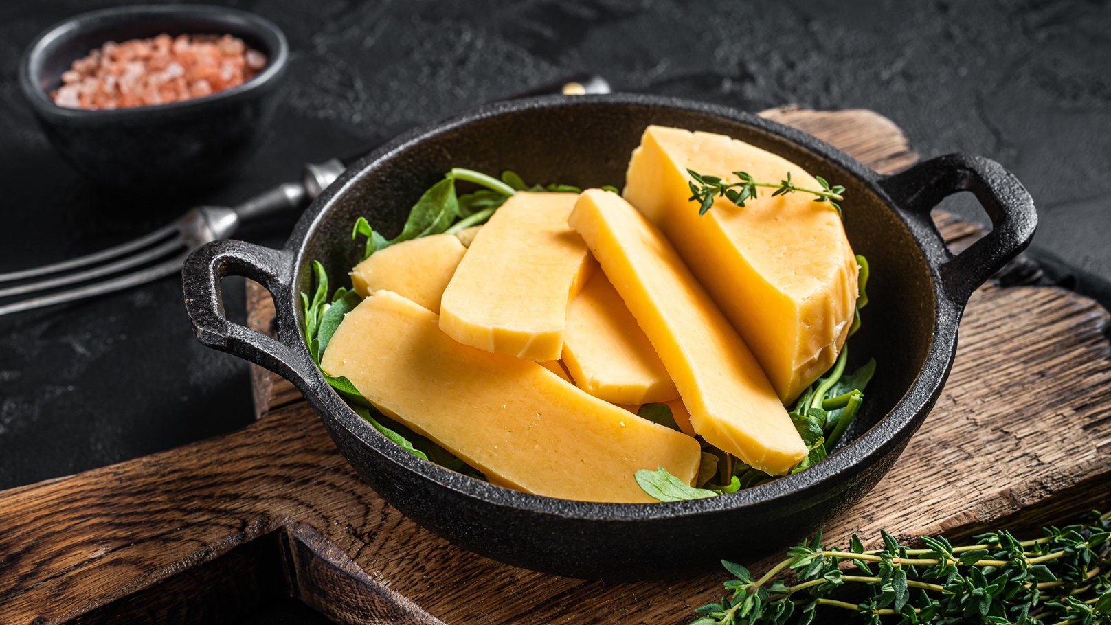 halloumi-cheese-in-pan-ready-for-grilling-black-b-2022-01-11-04-29-55-utc