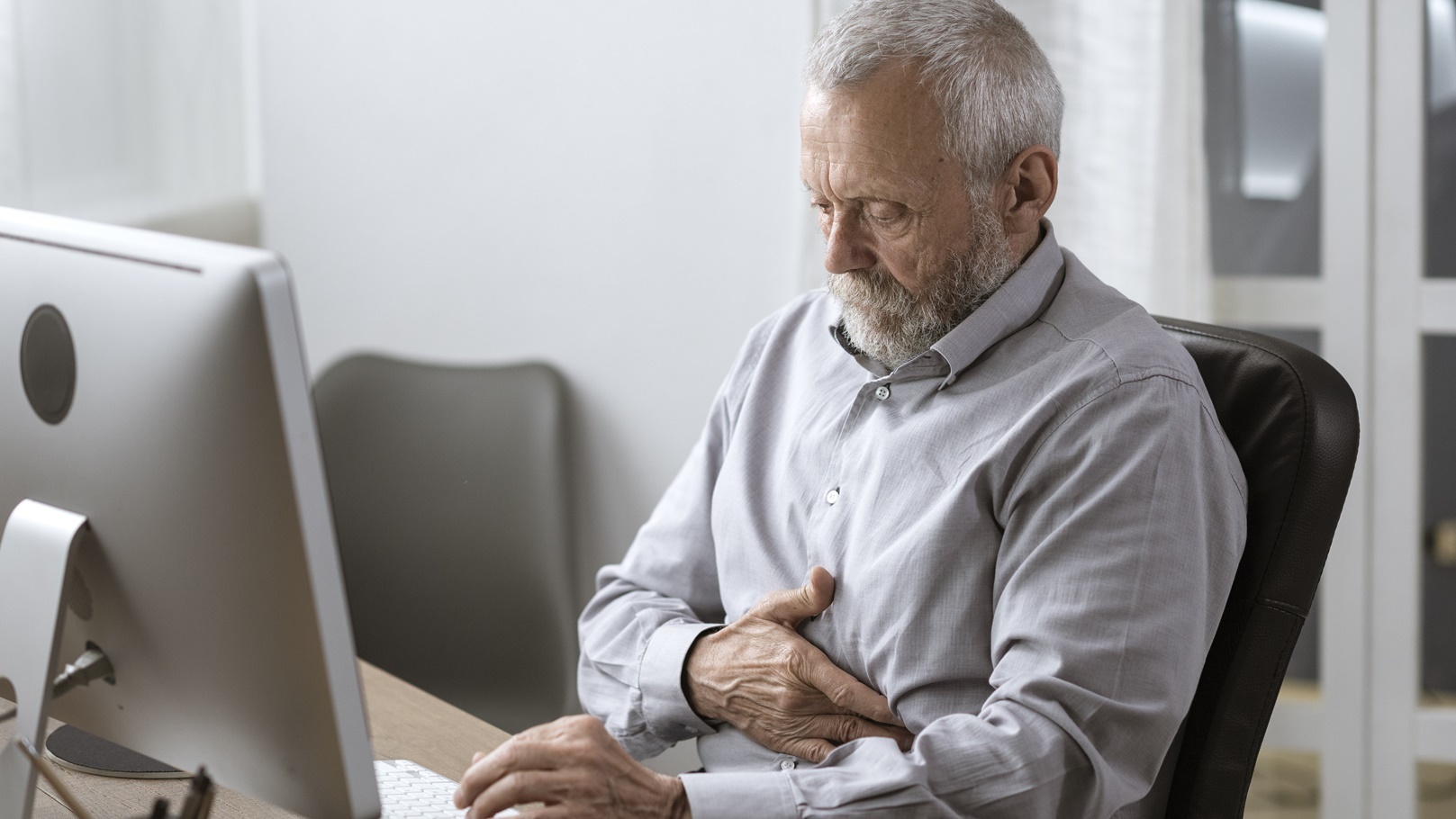 senior-man-having-a-bad-stomach-pain-2021-08-26-22-39-59-utc