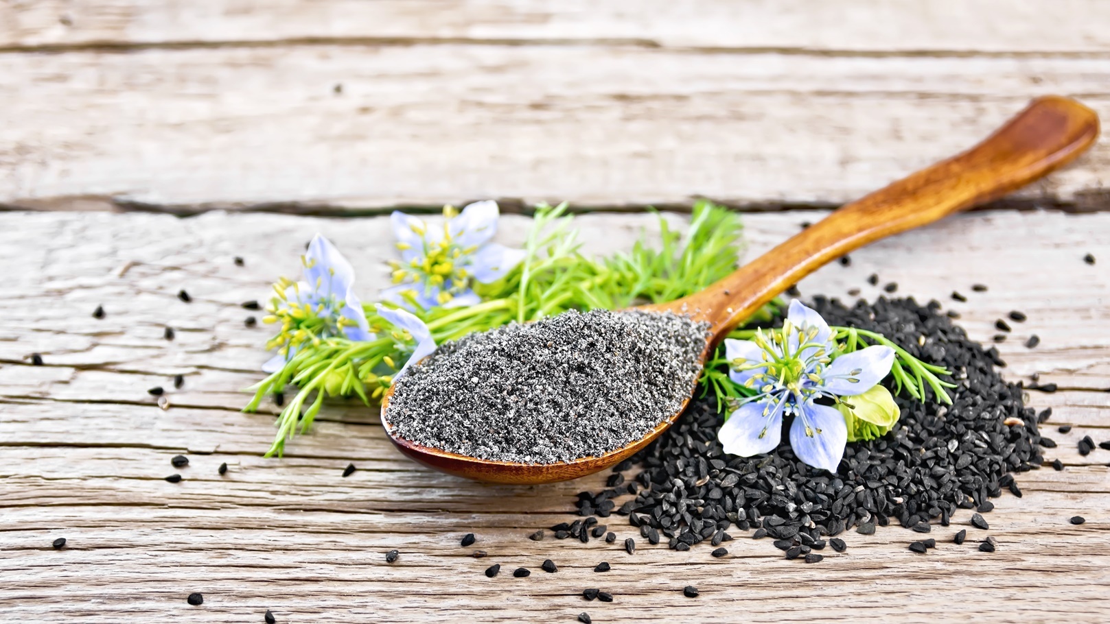 flour-of-kalingi-in-spoon-with-flower-on-old-board-2021-08-28-00-33-53-utc