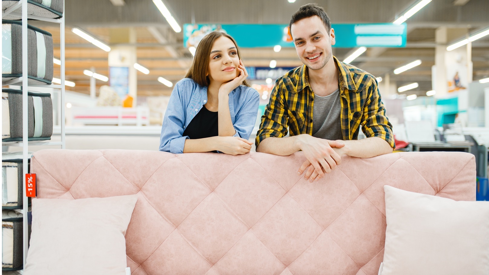 couple-poses-at-the-pink-couch-in-furniture-store-2021-08-28-09-23-32-utc