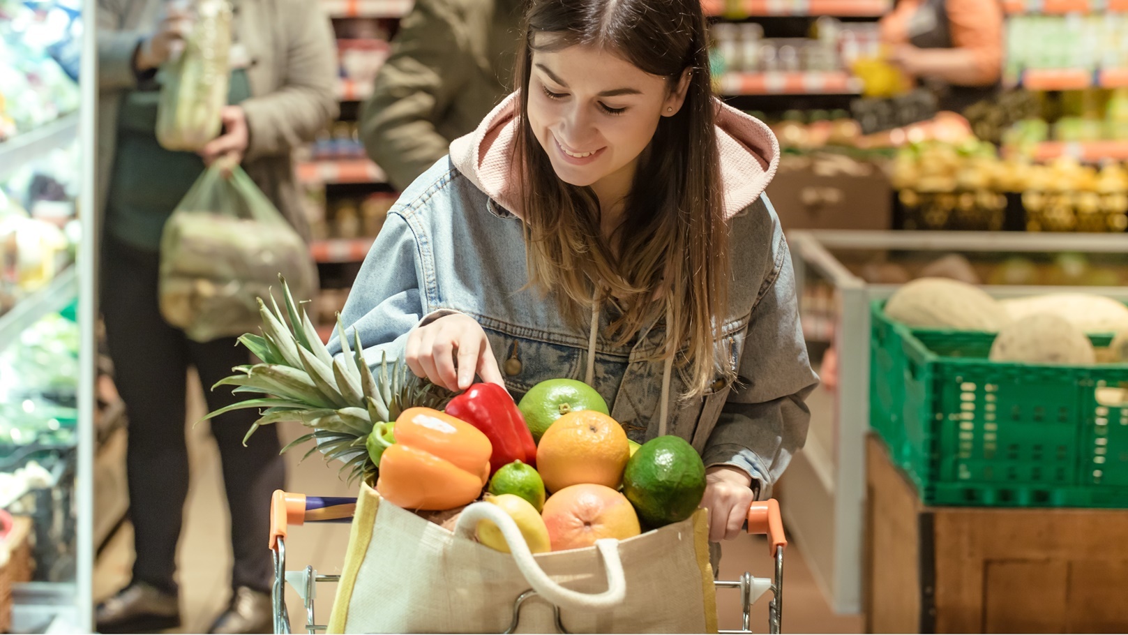 a-young-woman-buys-groceries-in-a-supermarket-2021-08-31-01-21-54-utc