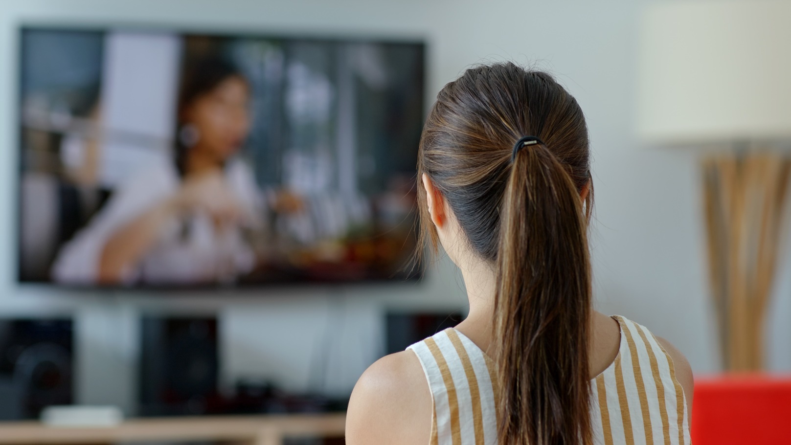 woman-watch-tv-at-home-2021-08-28-21-10-09-utc