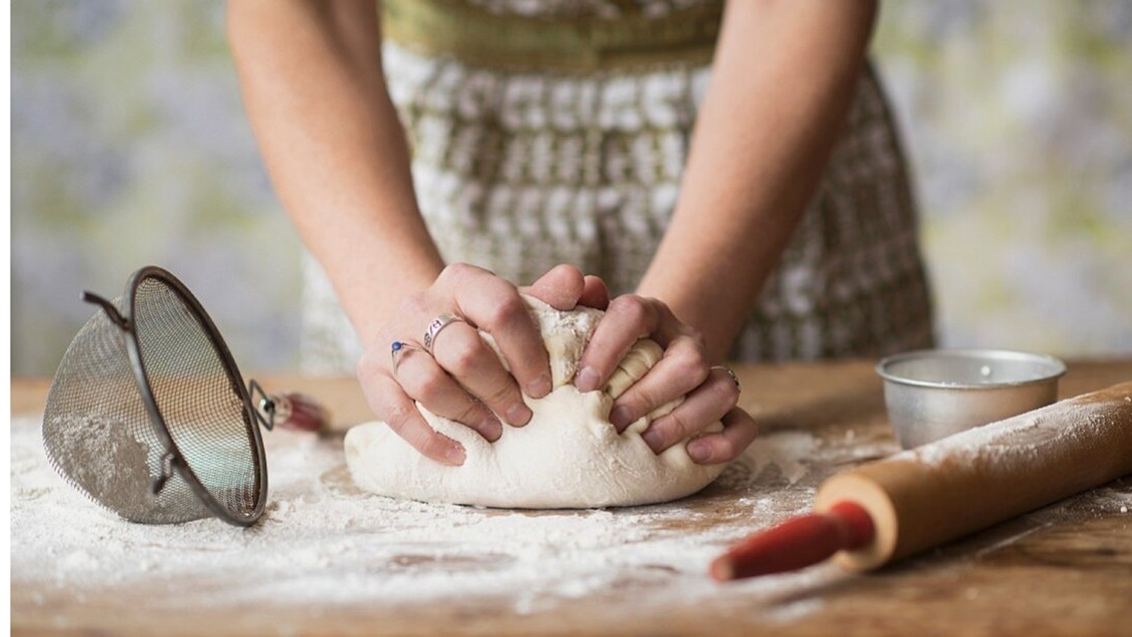11336301-A-woman-kneading-bread-dough
