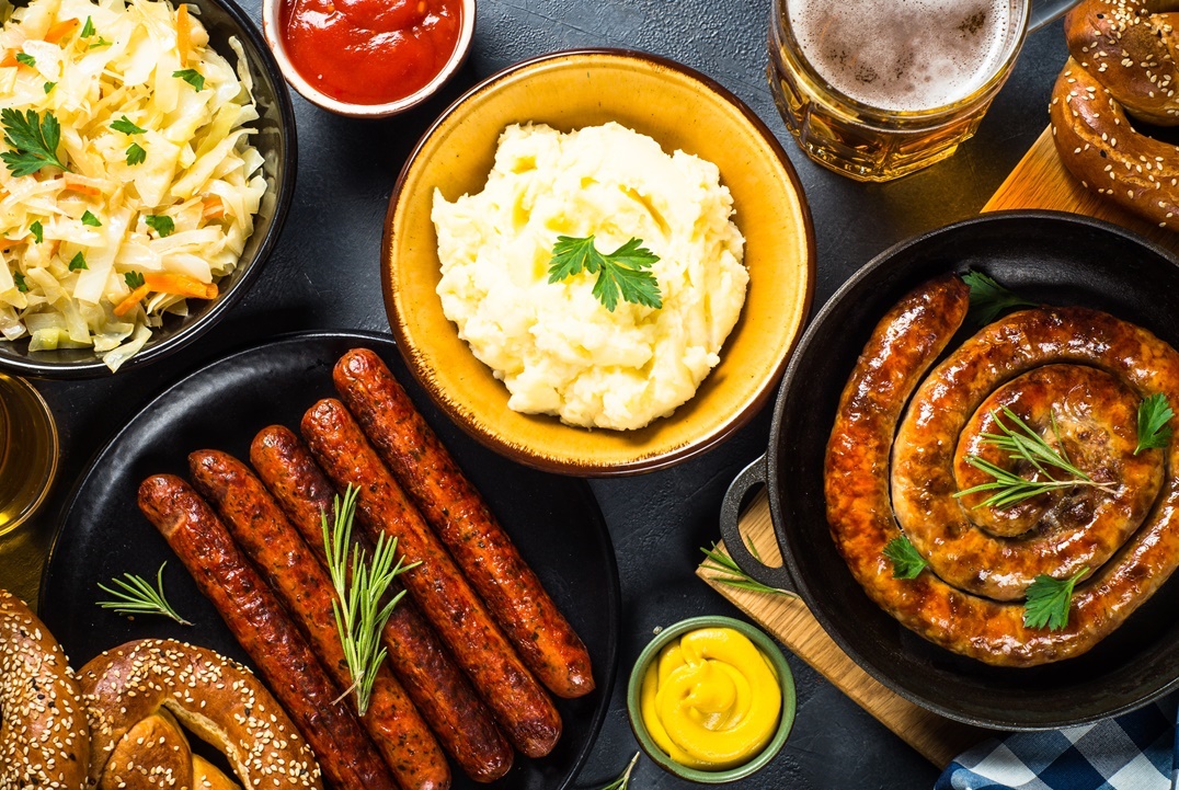 oktoberfest-food-sausage-beer-and-bretzel-2021-08-26-18-08-09-utc