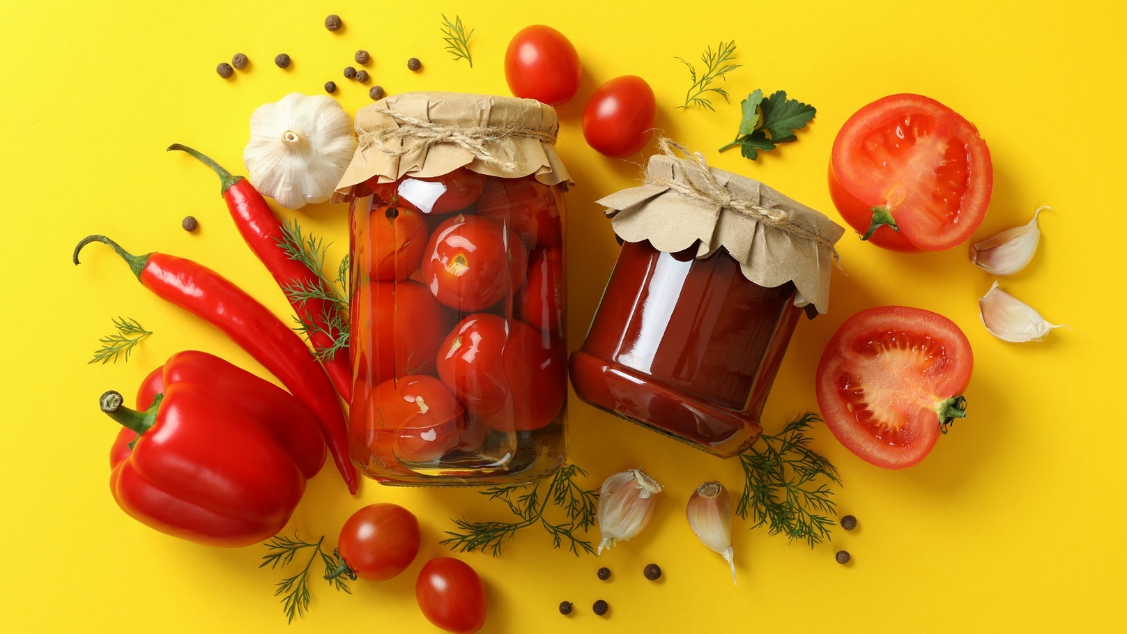pickled-tomatoes-and-ingredients-on-yellow-backgro-2021-08-31-23-37-00-utc