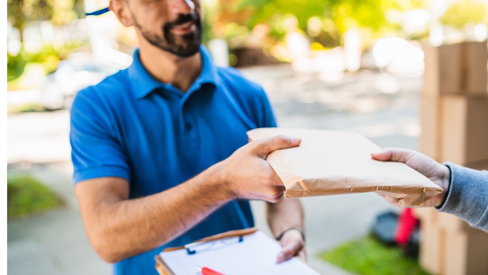 delivery-man-making-home-delivery-to-customer-2021-08-28-08-44-48-utc