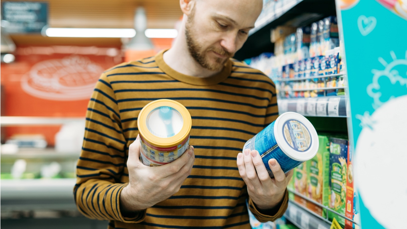 bearded-man-in-casual-clothes-choose-baby-powdered-2021-08-29-02-55-04-utc