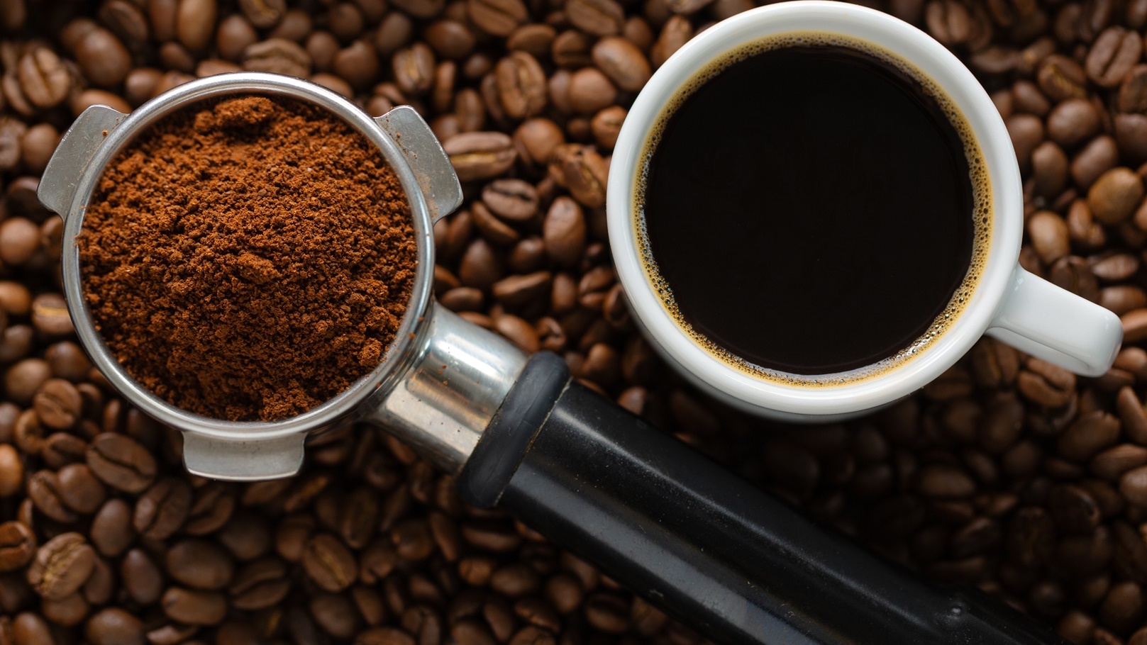 coffee-background-with-coffee-and-portafilter-2021-09-04-16-18-40-utc