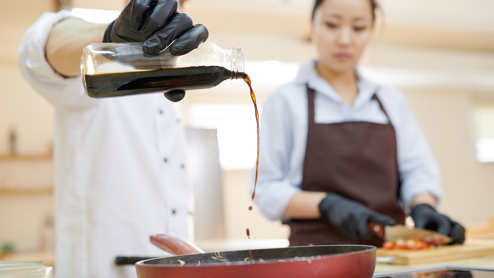 chef-pouring-soy-sauce-2021-09-24-03-49-28-utc