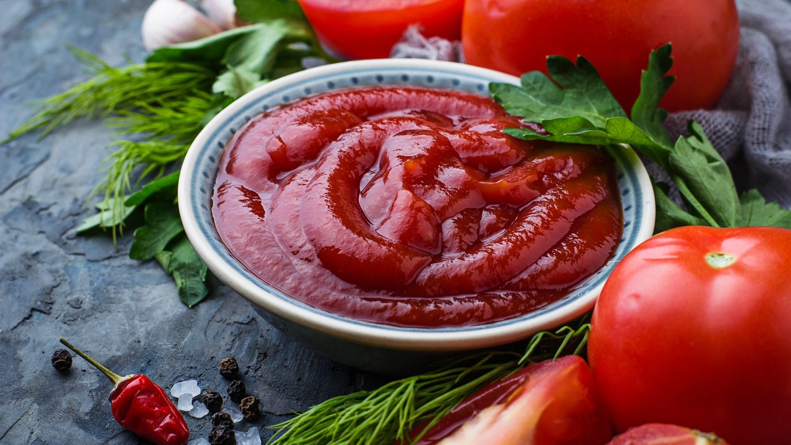 tomato-ketchup-sauce-on-concrete-background-2021-08-26-19-01-47-utc