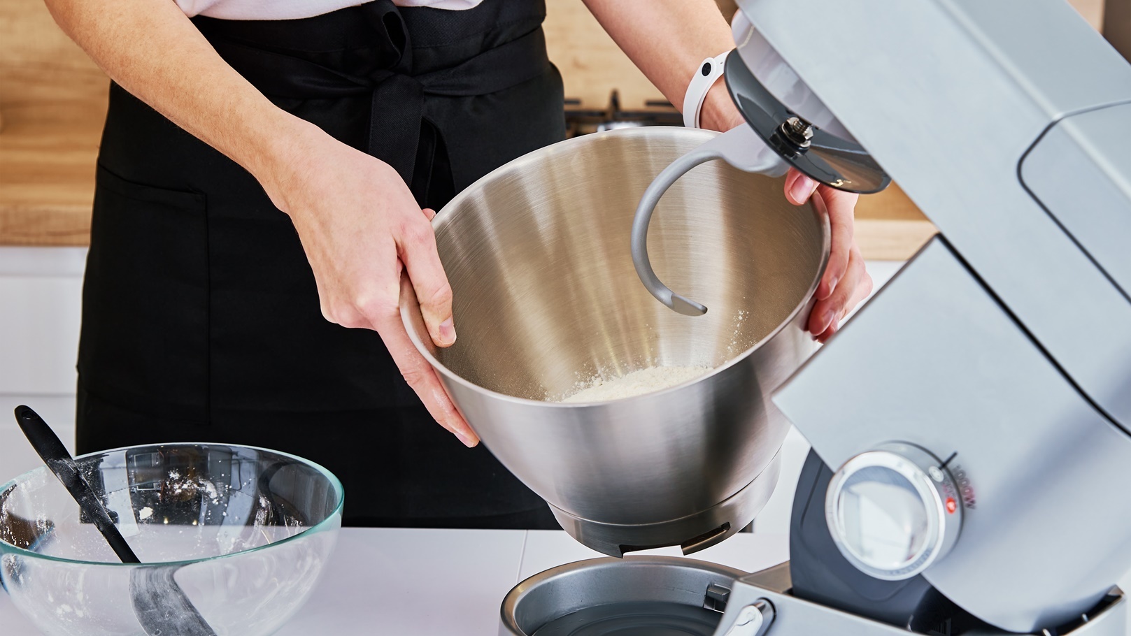 woman-cooking-at-kitchen-and-using-kitchen-machine-2022-02-13-17-50-25-utc