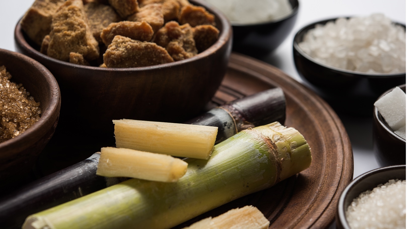 jaggery-sugar-variety-with-sugarcane-2021-08-28-05-51-00-utc