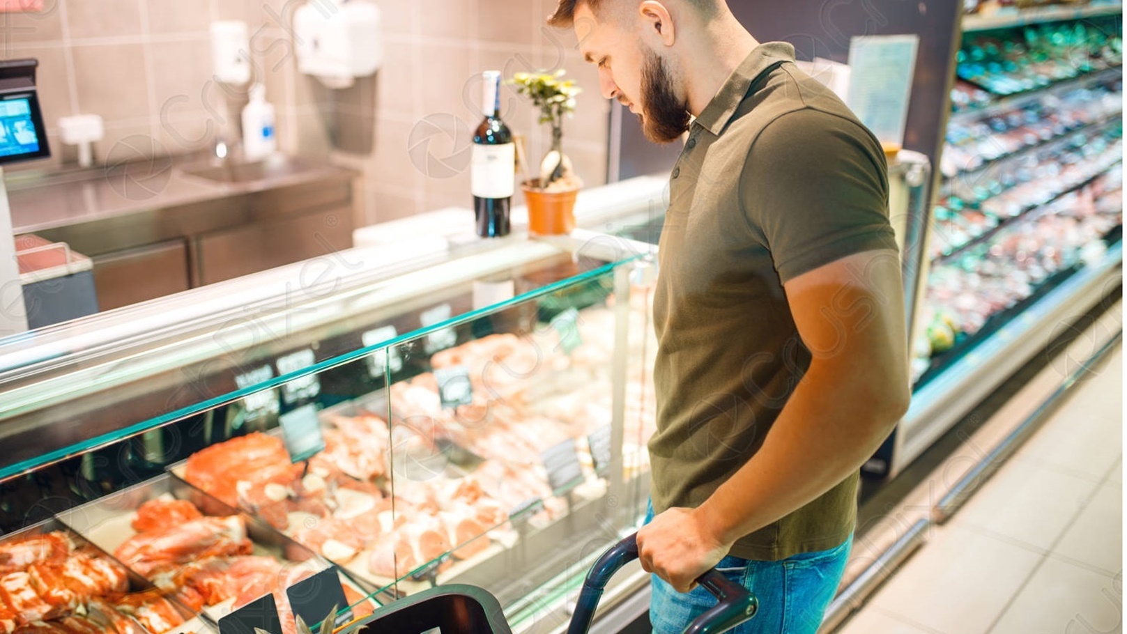 man-choosing-fresh-chilled-meat-2094144