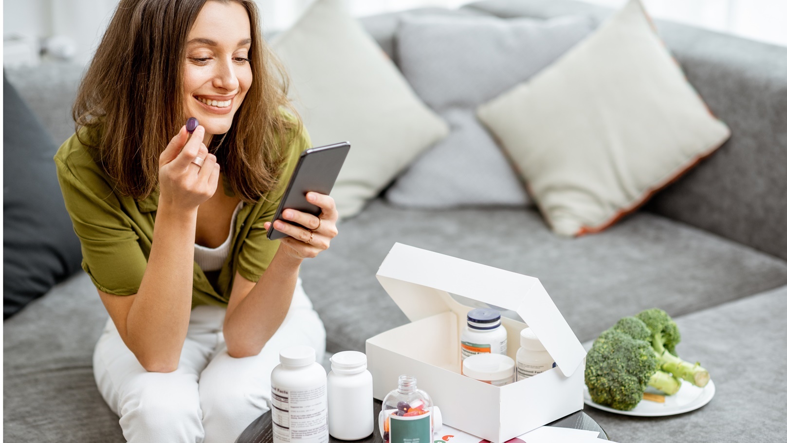 woman-taking-vitamins-or-nutritional-supplements-2021-09-01-14-31-06-utc