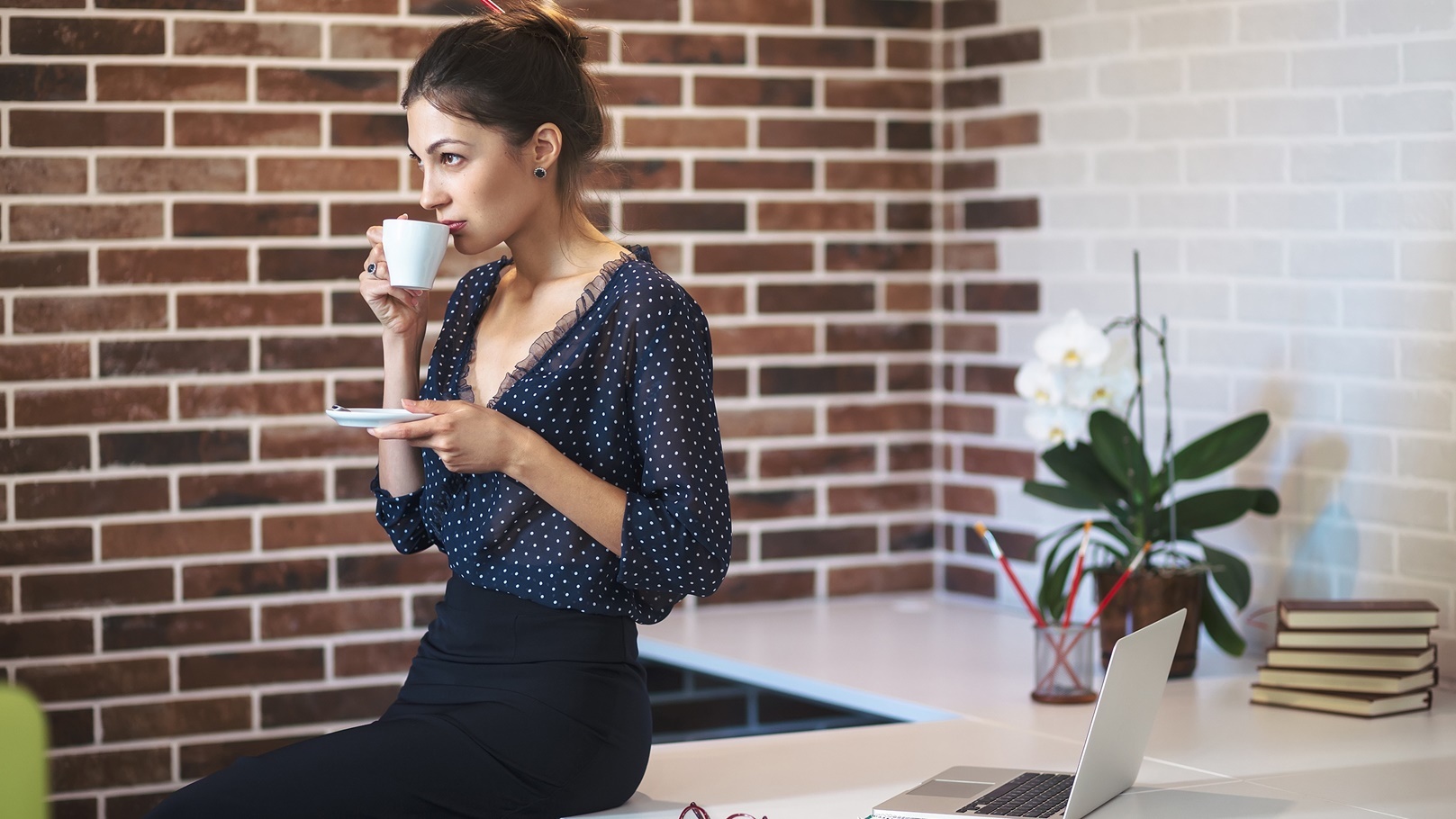 business-woman-drinking-coffe-in-the-office-2021-08-29-09-41-40-utc