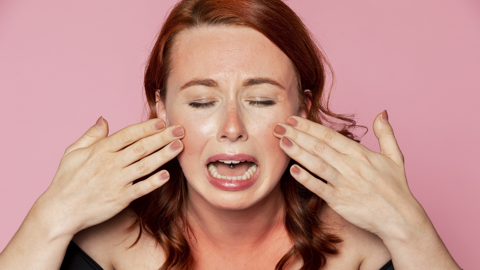 woman-crying-over-sunbunt-skin-2021-09-02-06-06-17-utc