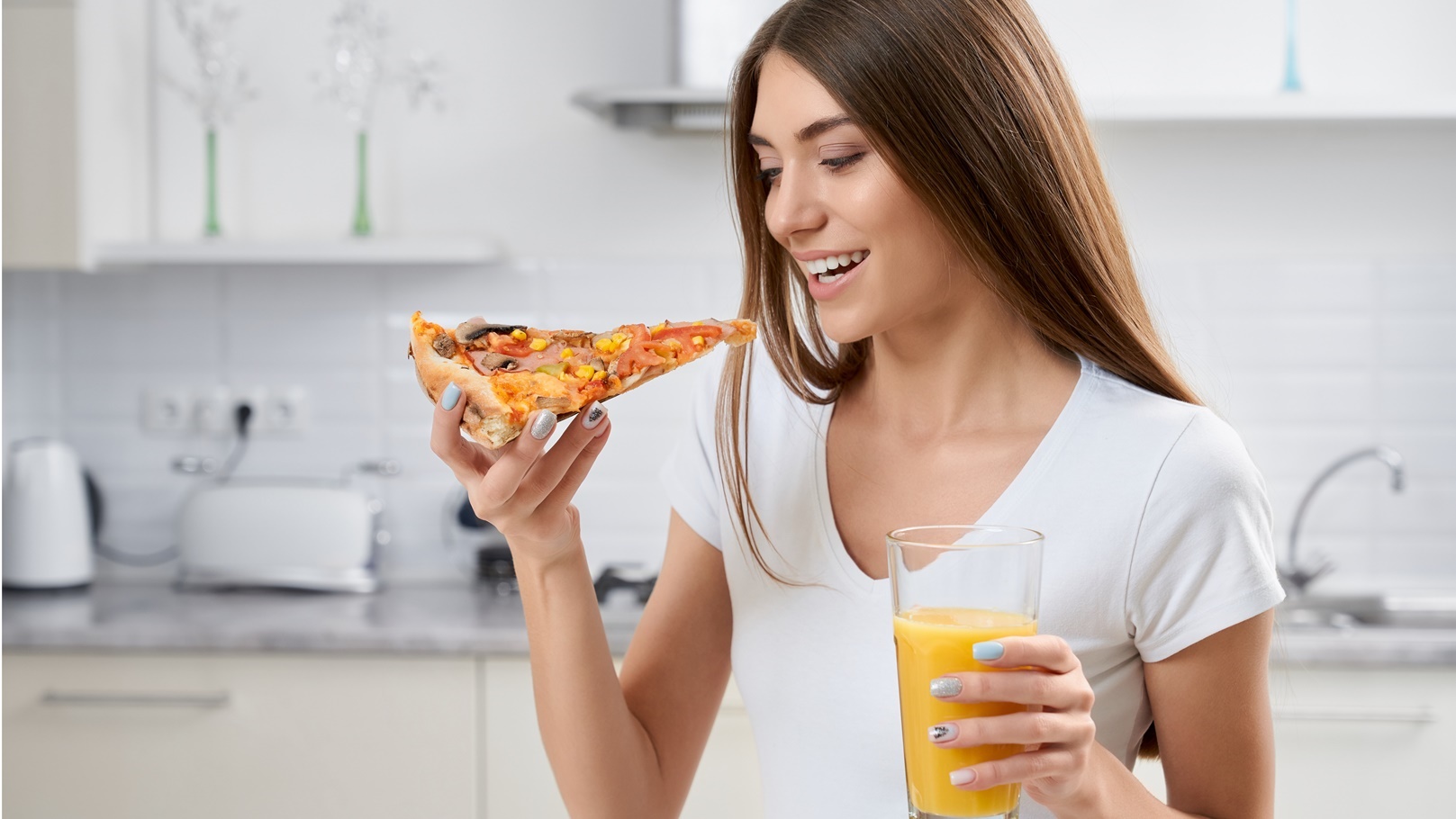 beautiful-brunette-eating-pizza-and-drinking-juice-2021-09-01-09-43-26-utc