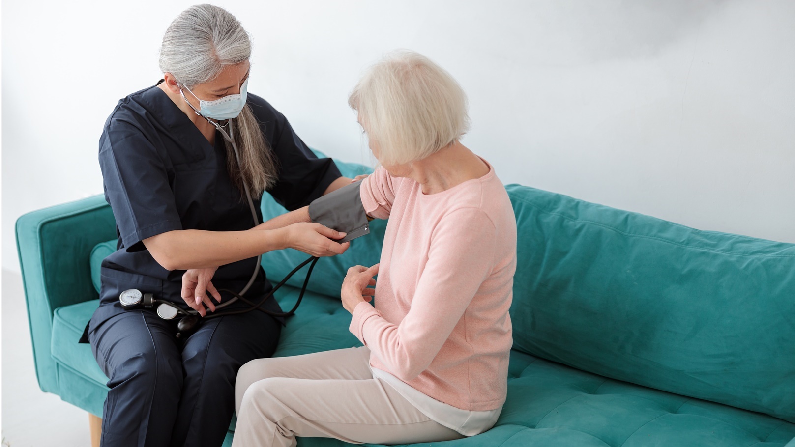 old-lady-with-her-doctor-on-appointment-2022-02-15-19-12-57-utc