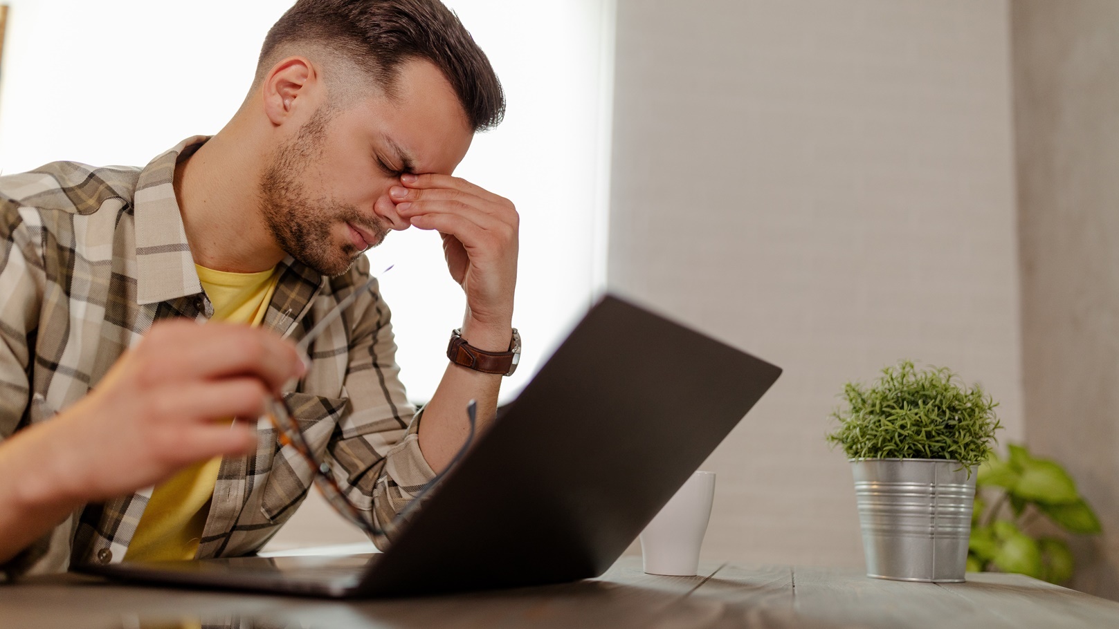 young-nervous-entrepreneur-is-using-computer-head-2022-02-08-02-16-56-utc