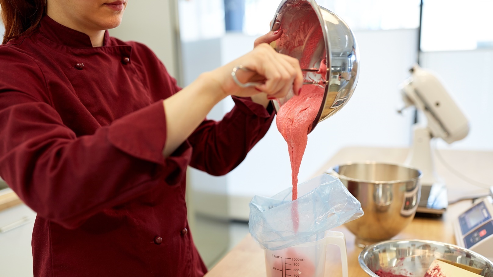 chef-making-macaron-batter-at-kitchen-2021-08-26-22-49-25-utc