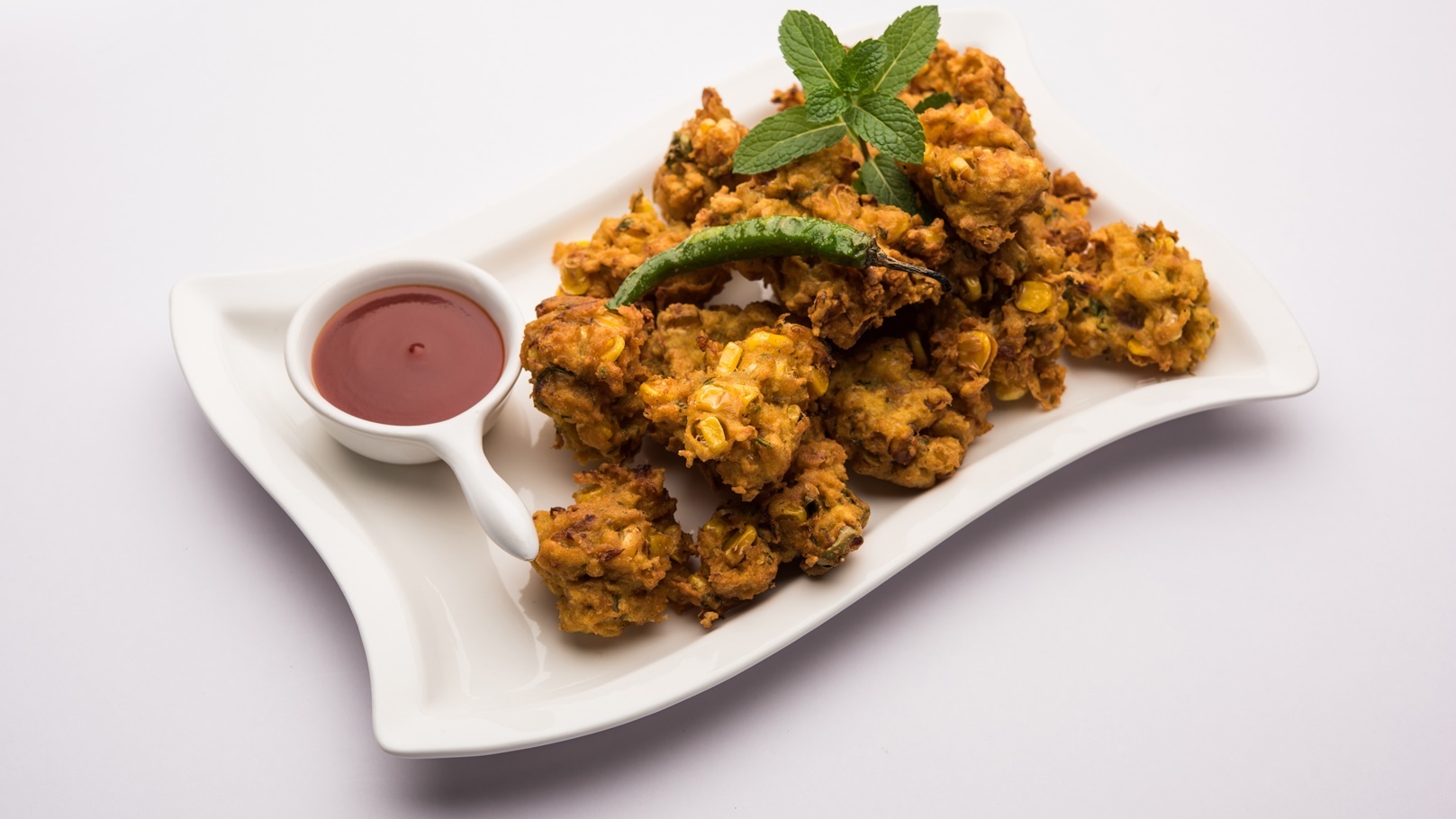 indian-crispy-corn-fritter-or-pakora-pakod-2021-08-28-01-49-46-utc