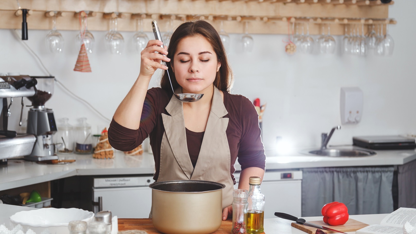 young-housewife-tasting-the-soup-is-cooking-2021-08-26-17-11-01-utc