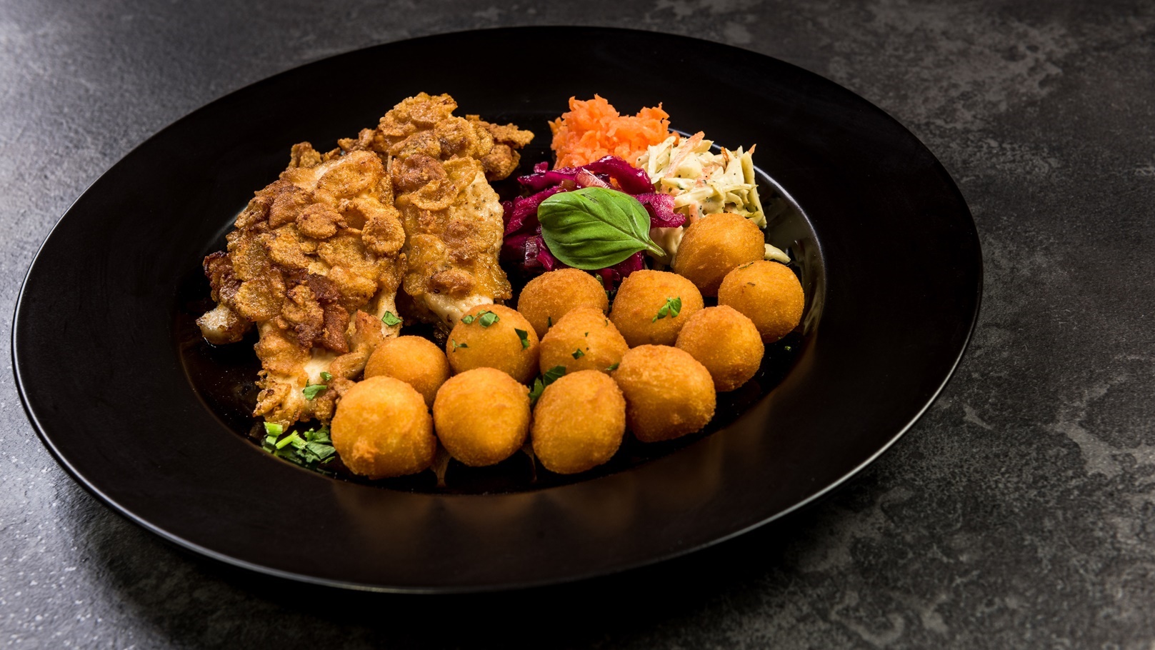 fried-chicken-with-potato-balls-and-salad-restaur-2021-08-26-16-37-20-utc