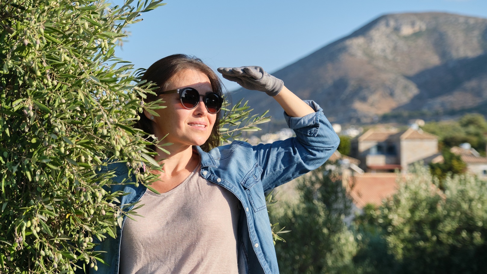 woman-worker-of-an-olive-farm-background-olive-ga-2022-03-17-15-18-39-utc