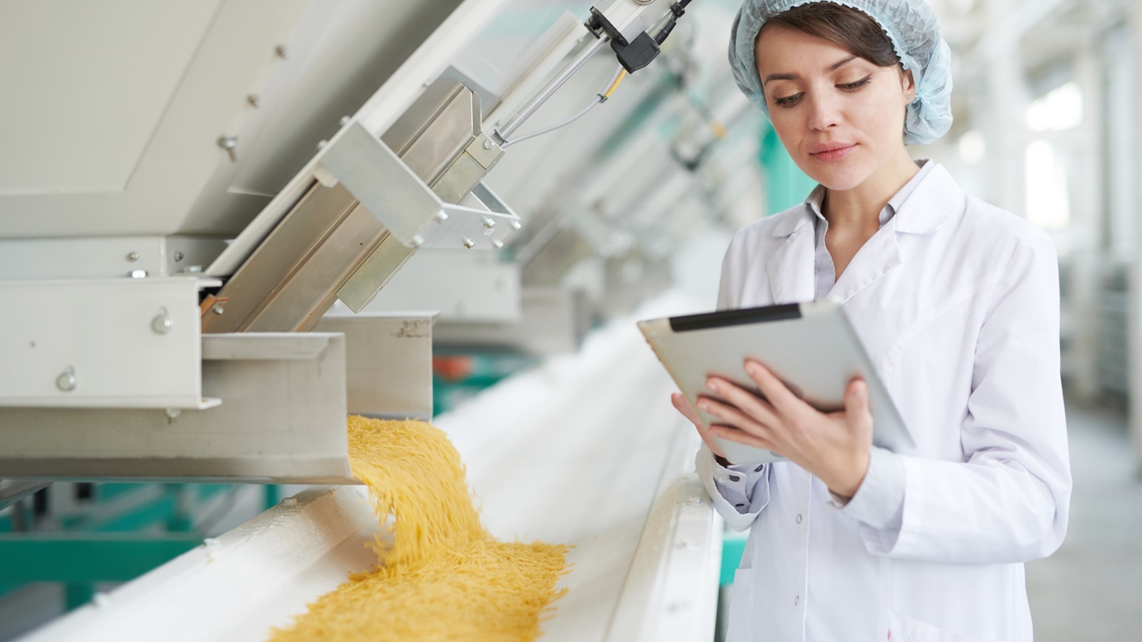 young-woman-at-food-factory-2021-09-24-03-50-57-utc