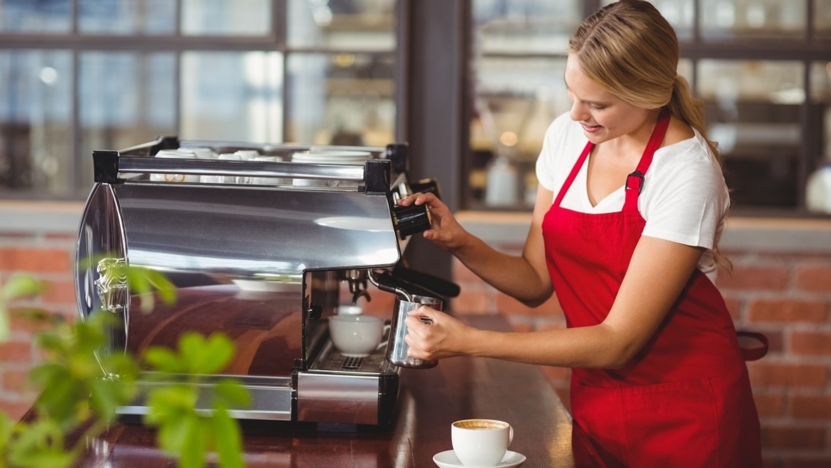 a-pretty-barista-preparing-coffee-at-the-coffee-sh-2021-08-28-16-11-02-utc
