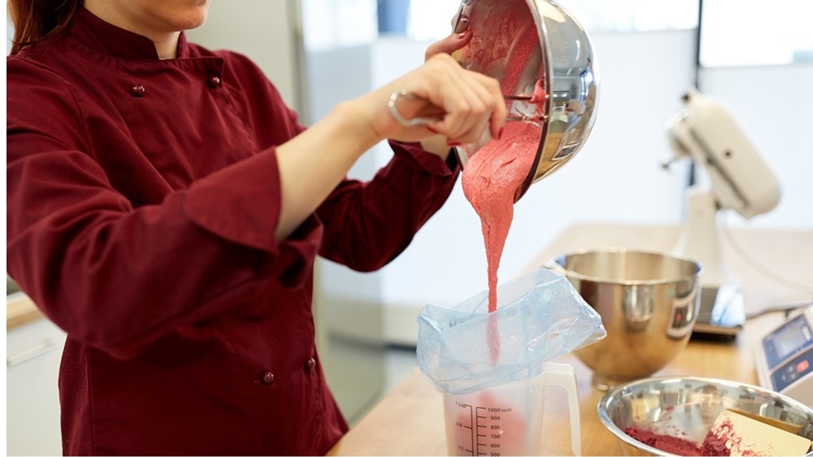 chef-making-macaron-batter-at-kitchen-2021-08-26-22-49-25-utc