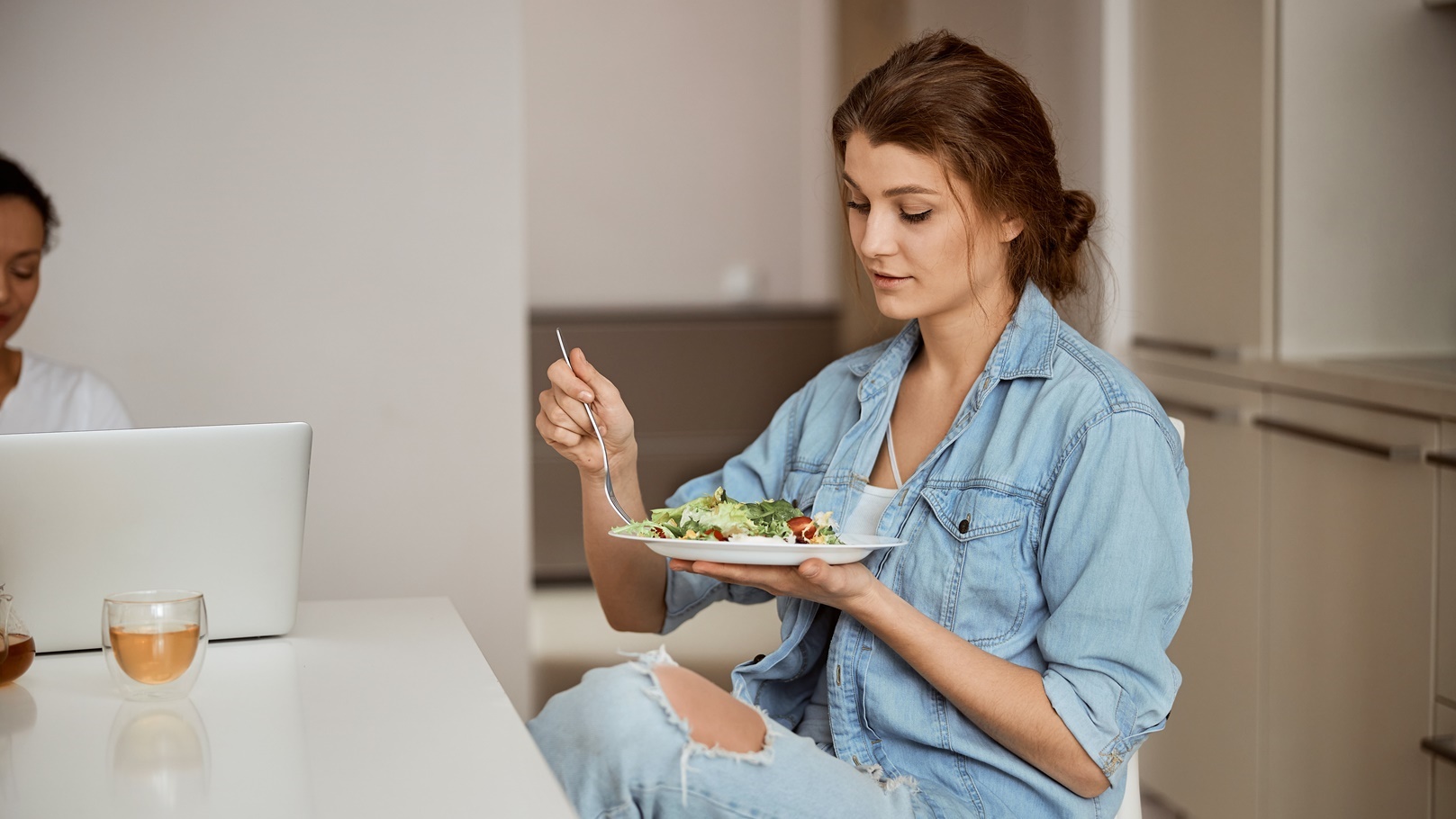 young-female-person-eating-salad-for-dinner-2021-09-03-10-52-19-utc