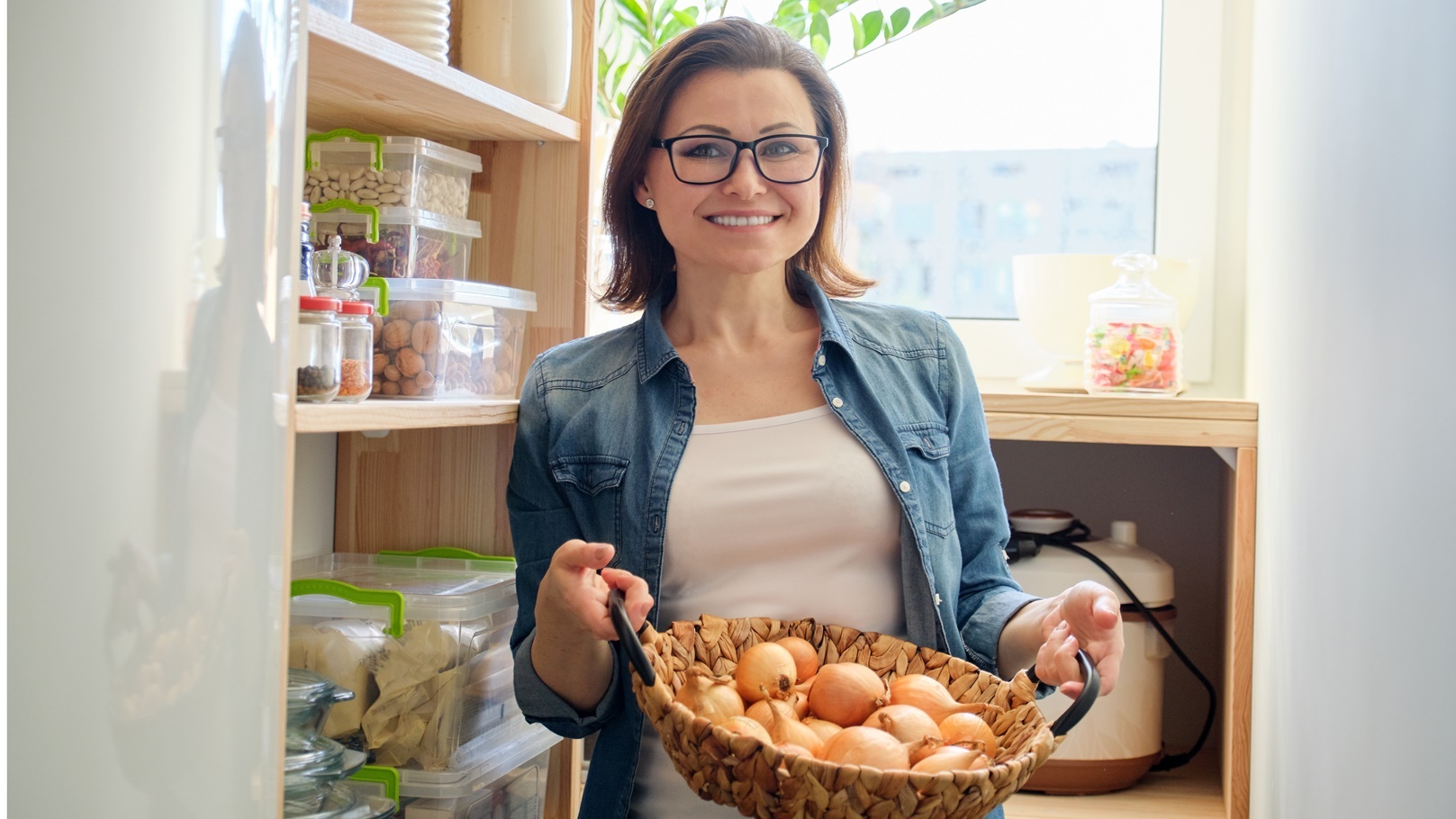 woman-in-pantry-taking-basket-with-onions-food-st-2022-01-13-23-36-05-utc