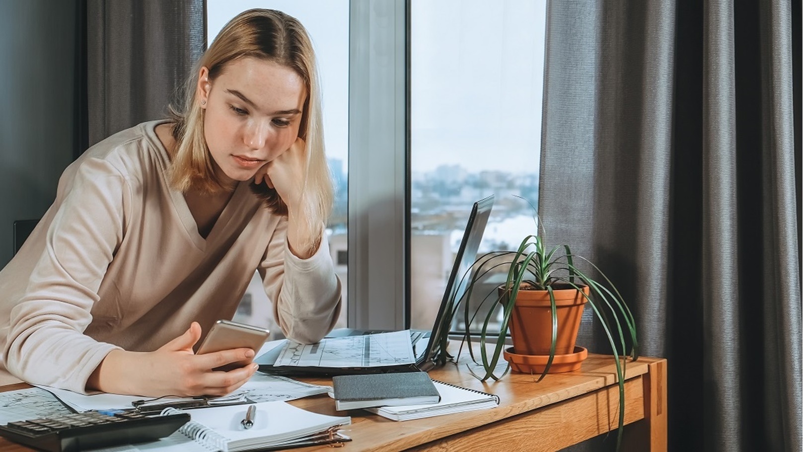 investments-young-woman-investor-buys-stocks-on-t-2022-01-12-05-19-44-utc