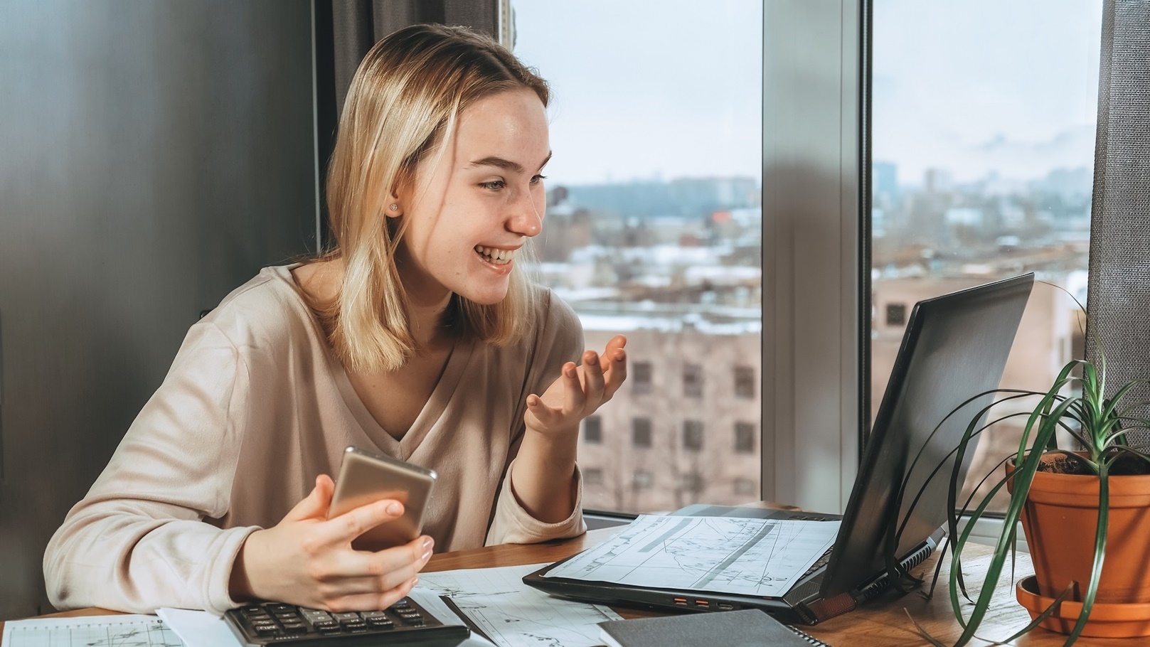 investments-young-woman-investor-buys-stocks-on-t-2022-01-12-05-19-51-utc