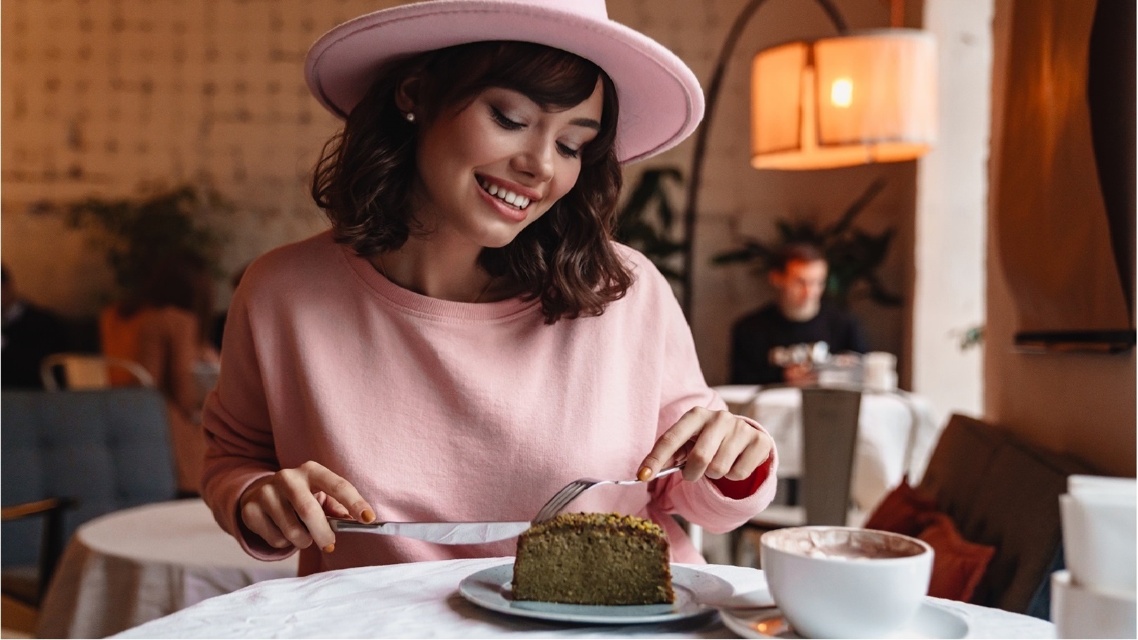 cheerful-positive-woman-indoors-in-cafe-eat-cake-2021-08-27-23-59-13-utc - Copy