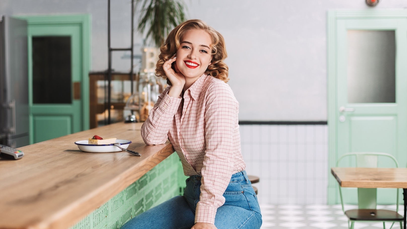 beautiful-lady-in-jeans-sitting-at-the-bar-counter-2021-08-27-09-50-50-utc