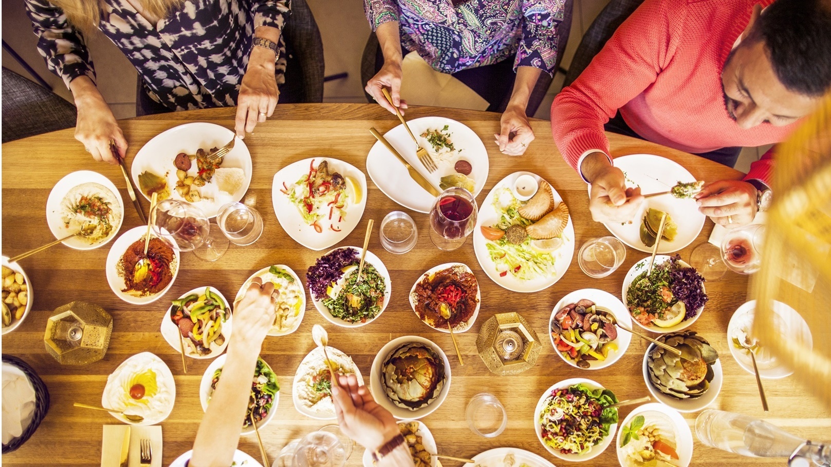 high-angle-view-of-male-and-female-friends-having-2021-08-29-00-50-07-utc