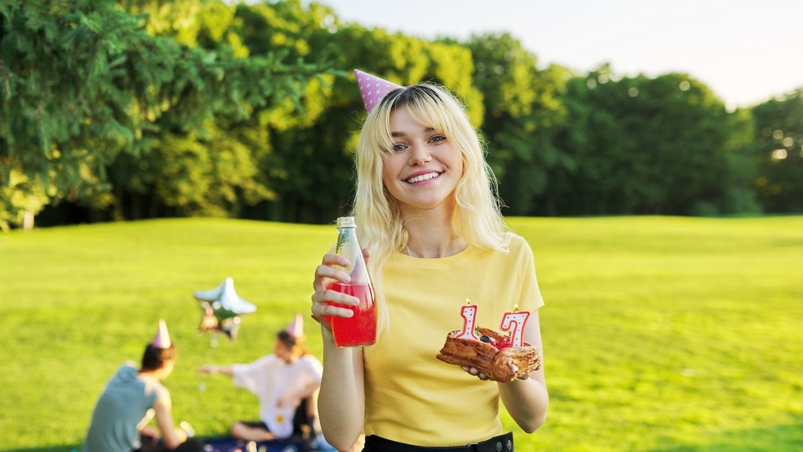 beautiful-teenage-girl-in-a-festiv-hat-on-her-birt-2022-01-13-23-33-37-utc