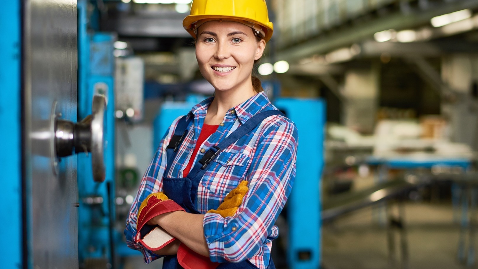 happy-young-woman-working-at-factory-2022-02-02-04-52-04-utc