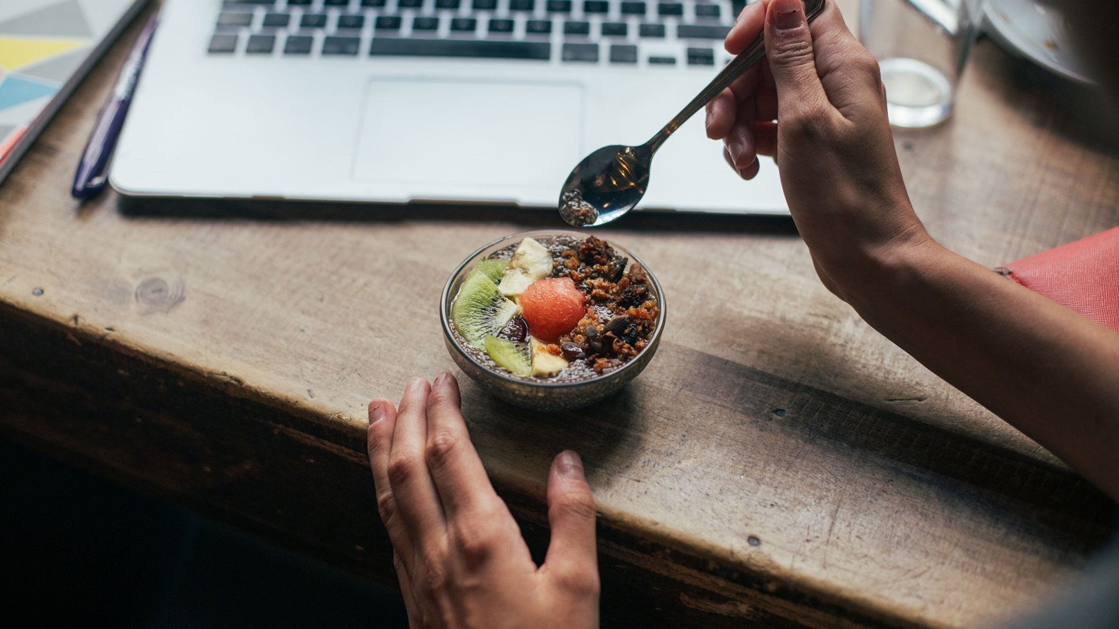 woman-eats-chia-seed-dessert-in-cafe-spot-2021-09-02-08-43-40-utc