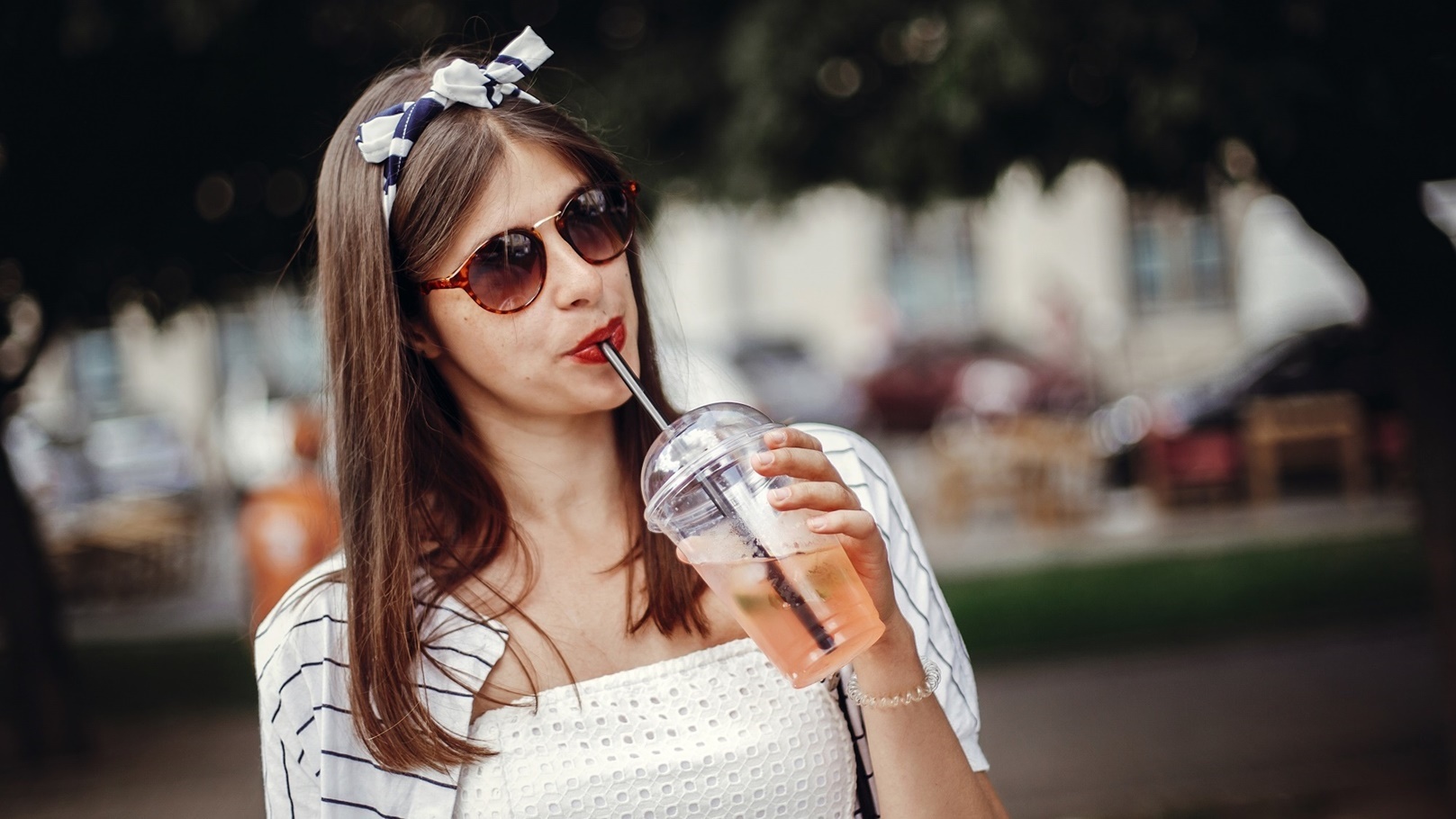 happy-hipster-girl-with-sunglasses-in-retro-dress-2021-08-29-08-35-40-utc