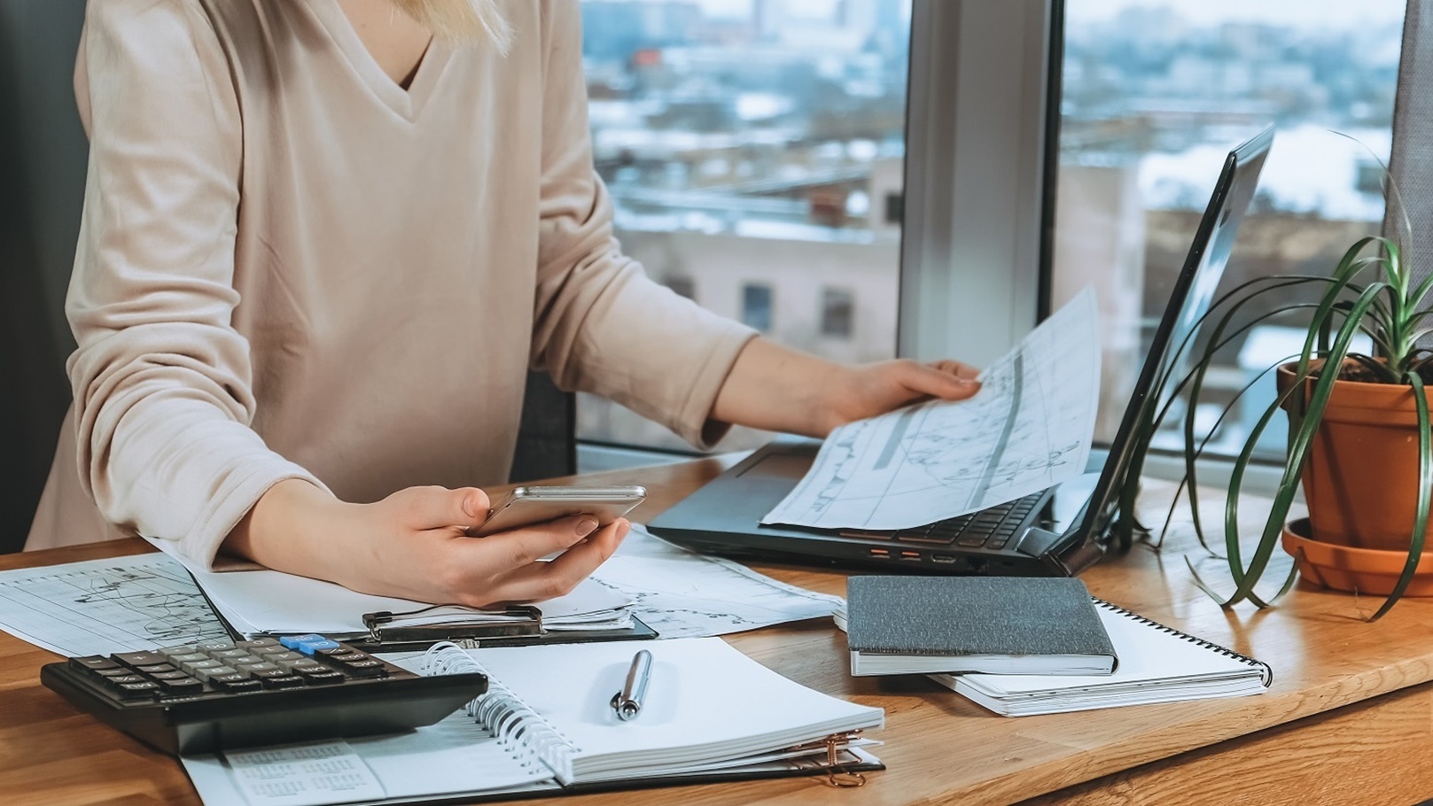 investment-young-woman-investor-buys-stocks-on-th-2022-01-27-22-21-52-utc