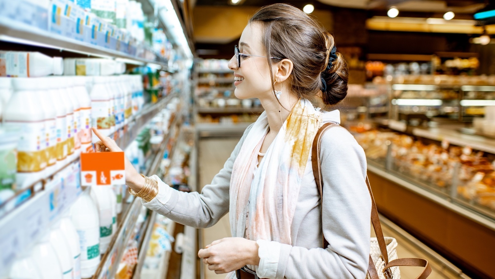 woman-buying-milk-in-the-supermarket-2022-01-19-00-17-48-utc (1)