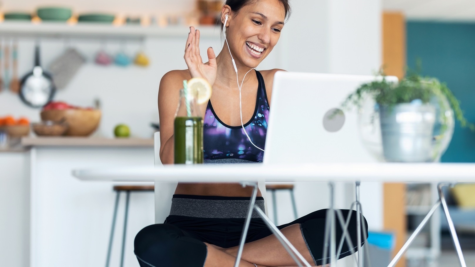 sporty-woman-having-online-video-call-via-laptop-w-2022-02-01-22-39-49-utc