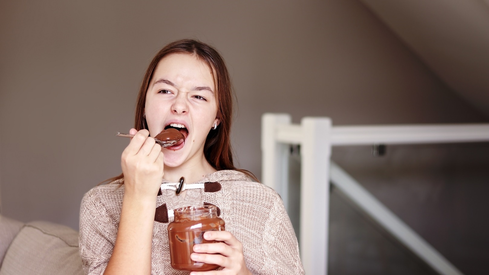 happy-teenager-girl-enjoying-eating-chocolate-crea-2021-08-29-20-41-26-utc